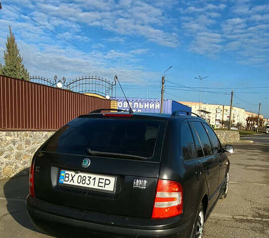 Черный Шкода Фабия, объемом двигателя 1.39 л и пробегом 225 тыс. км за 4300 $, фото 2 на Automoto.ua