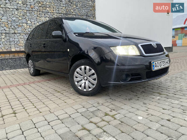 Черный Шкода Фабия, объемом двигателя 1.2 л и пробегом 205 тыс. км за 3200 $, фото 1 на Automoto.ua