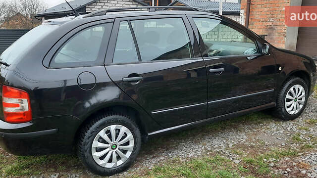 Черный Шкода Фабия, объемом двигателя 1.39 л и пробегом 168 тыс. км за 4600 $, фото 17 на Automoto.ua