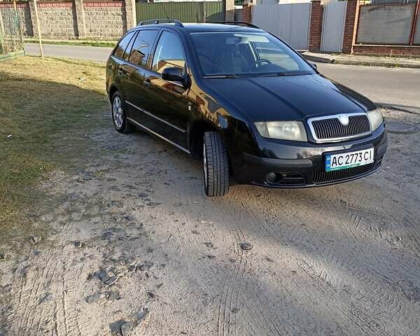 Черный Шкода Фабия, объемом двигателя 1.39 л и пробегом 237 тыс. км за 4100 $, фото 4 на Automoto.ua