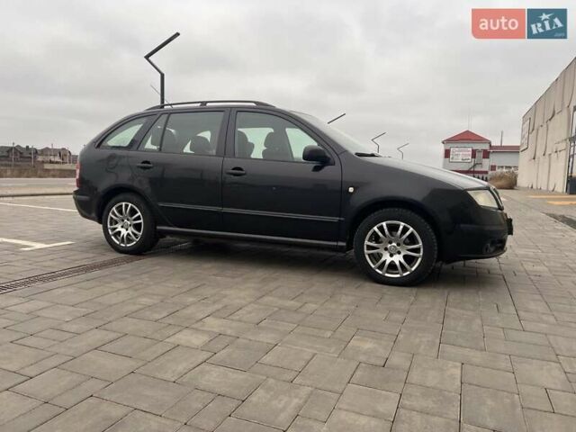 Черный Шкода Фабия, объемом двигателя 1.42 л и пробегом 262 тыс. км за 4200 $, фото 2 на Automoto.ua