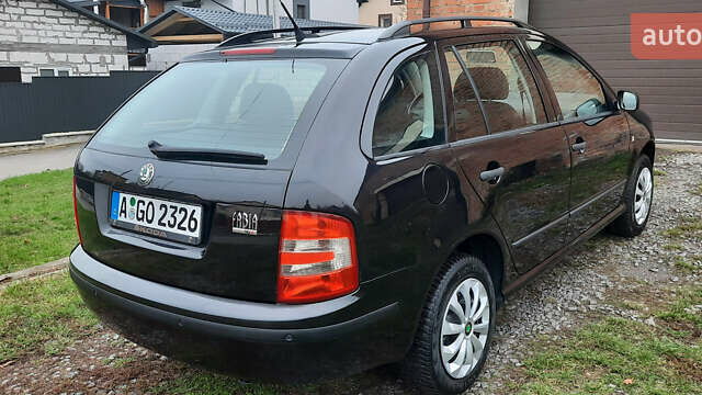 Черный Шкода Фабия, объемом двигателя 1.39 л и пробегом 168 тыс. км за 4600 $, фото 18 на Automoto.ua