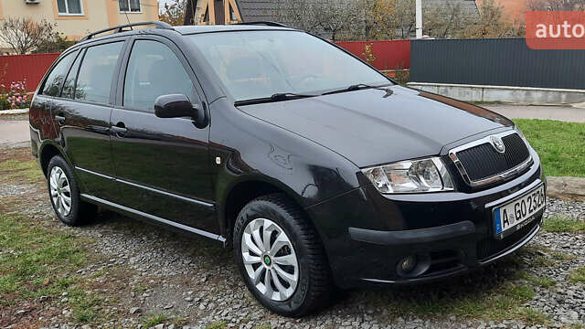 Черный Шкода Фабия, объемом двигателя 1.39 л и пробегом 168 тыс. км за 4600 $, фото 1 на Automoto.ua