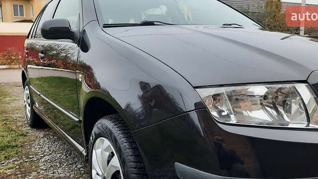 Черный Шкода Фабия, объемом двигателя 1.39 л и пробегом 168 тыс. км за 4600 $, фото 21 на Automoto.ua