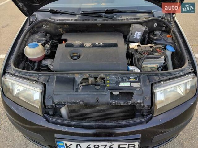 Черный Шкода Фабия, объемом двигателя 1.39 л и пробегом 240 тыс. км за 5000 $, фото 3 на Automoto.ua