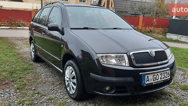 Черный Шкода Фабия, объемом двигателя 1.39 л и пробегом 168 тыс. км за 4600 $, фото 8 на Automoto.ua