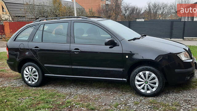 Черный Шкода Фабия, объемом двигателя 1.39 л и пробегом 168 тыс. км за 4600 $, фото 15 на Automoto.ua