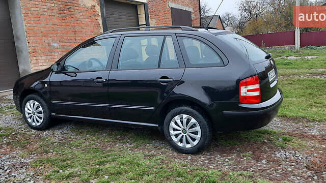 Черный Шкода Фабия, объемом двигателя 1.39 л и пробегом 168 тыс. км за 4600 $, фото 14 на Automoto.ua