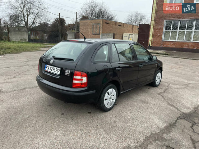 Черный Шкода Фабия, объемом двигателя 1.2 л и пробегом 245 тыс. км за 3450 $, фото 17 на Automoto.ua