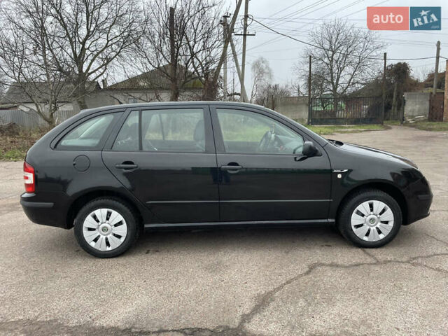 Черный Шкода Фабия, объемом двигателя 1.2 л и пробегом 245 тыс. км за 3450 $, фото 3 на Automoto.ua
