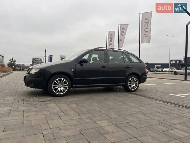 Черный Шкода Фабия, объемом двигателя 1.42 л и пробегом 262 тыс. км за 4200 $, фото 1 на Automoto.ua