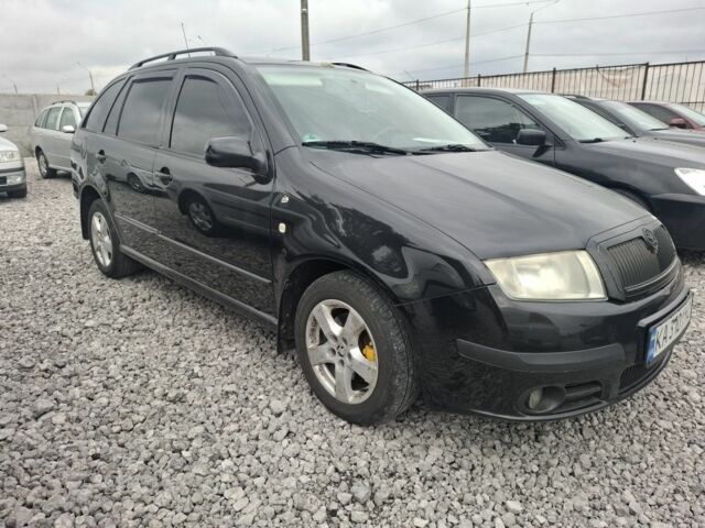 Черный Шкода Фабия, объемом двигателя 1.4 л и пробегом 229 тыс. км за 4350 $, фото 3 на Automoto.ua