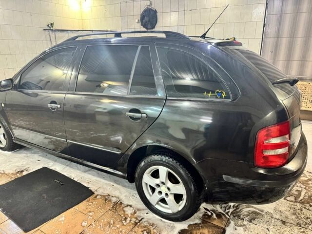 Черный Шкода Фабия, объемом двигателя 1.4 л и пробегом 232 тыс. км за 4200 $, фото 5 на Automoto.ua