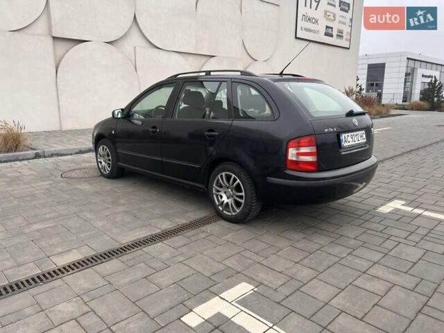 Черный Шкода Фабия, объемом двигателя 1.42 л и пробегом 262 тыс. км за 4200 $, фото 3 на Automoto.ua