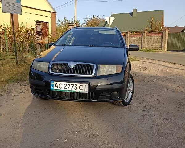 Черный Шкода Фабия, объемом двигателя 1.39 л и пробегом 237 тыс. км за 4100 $, фото 2 на Automoto.ua