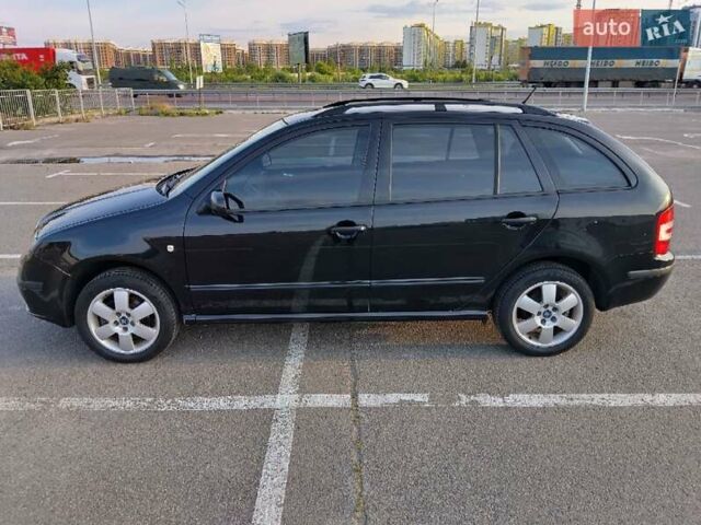 Черный Шкода Фабия, объемом двигателя 1.39 л и пробегом 240 тыс. км за 5000 $, фото 31 на Automoto.ua