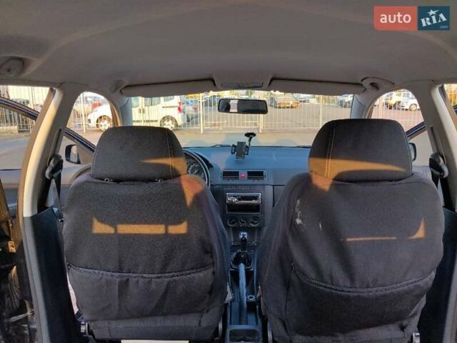 Черный Шкода Фабия, объемом двигателя 1.39 л и пробегом 240 тыс. км за 5000 $, фото 11 на Automoto.ua