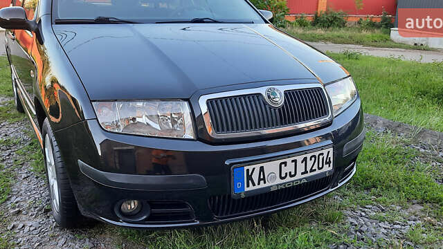 Черный Шкода Фабия, объемом двигателя 1.39 л и пробегом 167 тыс. км за 4999 $, фото 7 на Automoto.ua