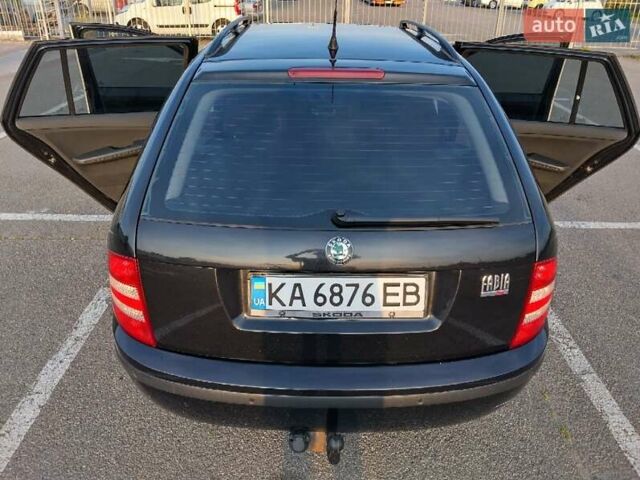 Черный Шкода Фабия, объемом двигателя 1.39 л и пробегом 240 тыс. км за 5000 $, фото 12 на Automoto.ua
