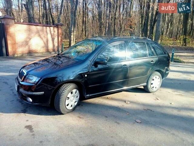 Черный Шкода Фабия, объемом двигателя 1.2 л и пробегом 207 тыс. км за 3100 $, фото 1 на Automoto.ua