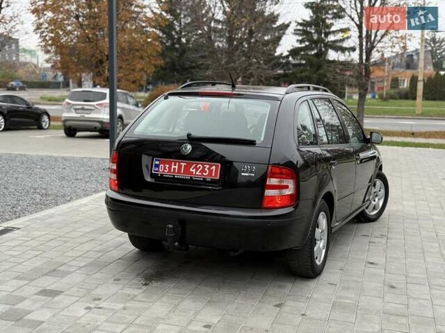 Черный Шкода Фабия, объемом двигателя 1.39 л и пробегом 249 тыс. км за 4550 $, фото 3 на Automoto.ua
