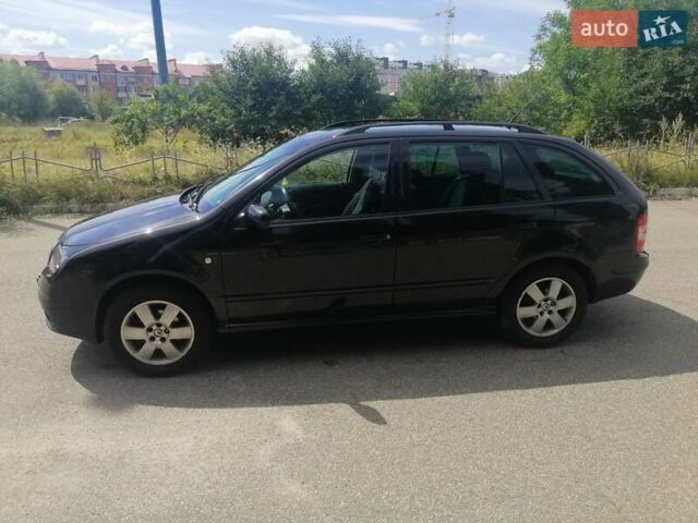 Черный Шкода Фабия, объемом двигателя 1.4 л и пробегом 235 тыс. км за 4700 $, фото 21 на Automoto.ua