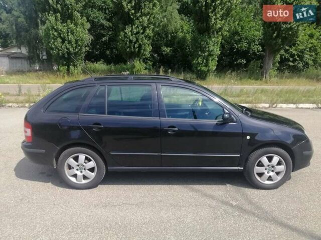 Черный Шкода Фабия, объемом двигателя 1.4 л и пробегом 235 тыс. км за 4700 $, фото 6 на Automoto.ua