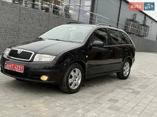 Черный Шкода Фабия, объемом двигателя 1.39 л и пробегом 249 тыс. км за 4550 $, фото 9 на Automoto.ua
