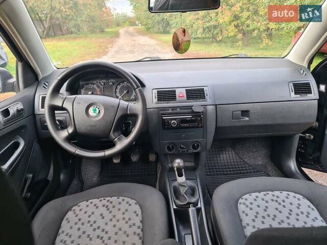 Черный Шкода Фабия, объемом двигателя 1.4 л и пробегом 196 тыс. км за 4699 $, фото 6 на Automoto.ua