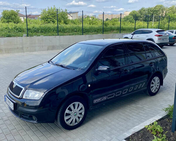 Черный Шкода Фабия, объемом двигателя 1.4 л и пробегом 252 тыс. км за 3850 $, фото 6 на Automoto.ua