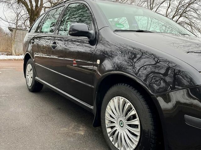 Черный Шкода Фабия, объемом двигателя 1.4 л и пробегом 179 тыс. км за 4700 $, фото 5 на Automoto.ua
