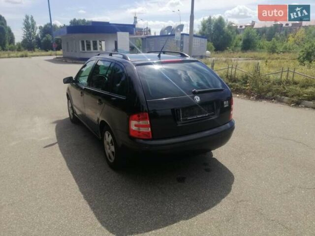 Черный Шкода Фабия, объемом двигателя 1.4 л и пробегом 235 тыс. км за 4700 $, фото 13 на Automoto.ua