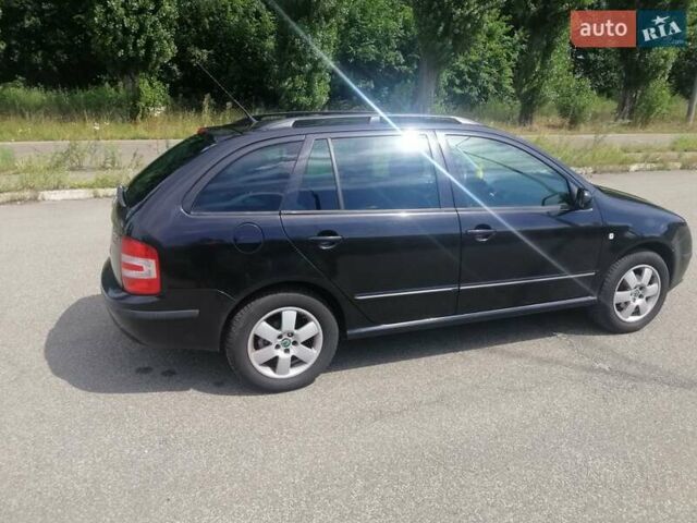 Черный Шкода Фабия, объемом двигателя 1.4 л и пробегом 235 тыс. км за 4700 $, фото 8 на Automoto.ua