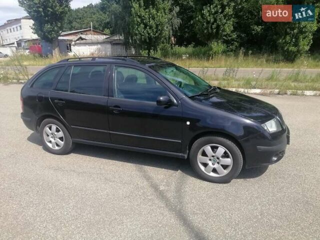 Черный Шкода Фабия, объемом двигателя 1.4 л и пробегом 235 тыс. км за 4700 $, фото 4 на Automoto.ua