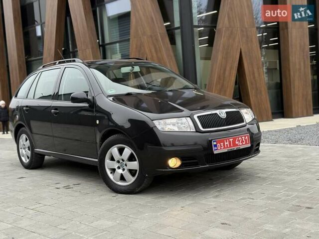 Черный Шкода Фабия, объемом двигателя 1.39 л и пробегом 249 тыс. км за 4550 $, фото 8 на Automoto.ua