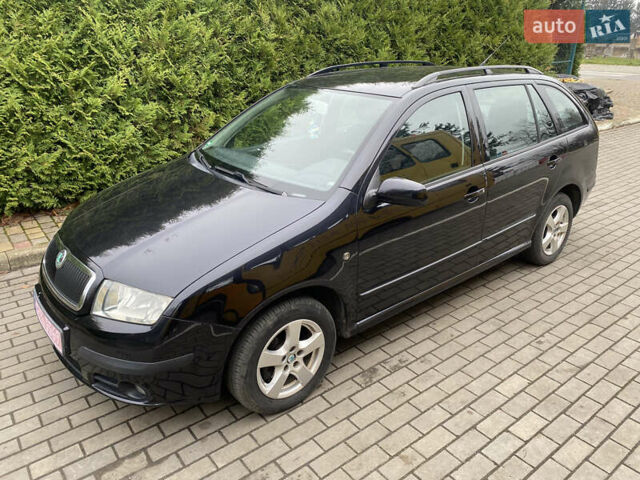 Черный Шкода Фабия, объемом двигателя 1.4 л и пробегом 246 тыс. км за 4399 $, фото 12 на Automoto.ua