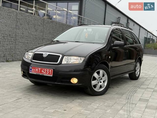 Черный Шкода Фабия, объемом двигателя 1.39 л и пробегом 249 тыс. км за 4550 $, фото 1 на Automoto.ua