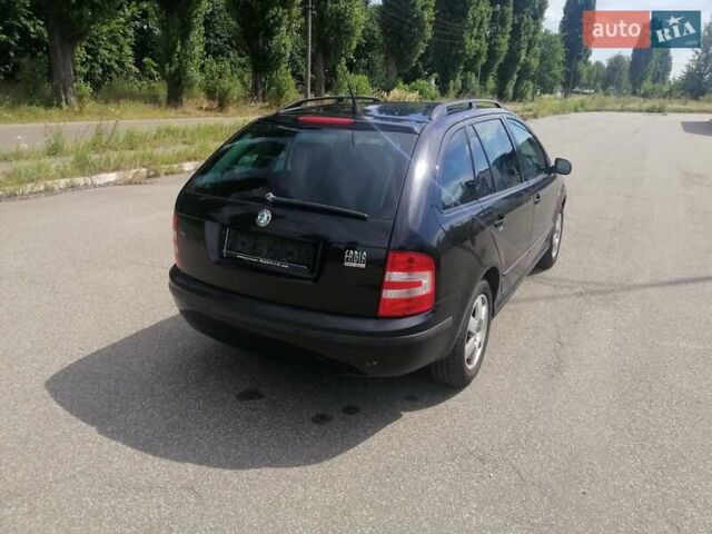 Черный Шкода Фабия, объемом двигателя 1.4 л и пробегом 235 тыс. км за 4700 $, фото 15 на Automoto.ua