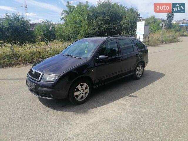 Черный Шкода Фабия, объемом двигателя 1.4 л и пробегом 235 тыс. км за 4700 $, фото 22 на Automoto.ua