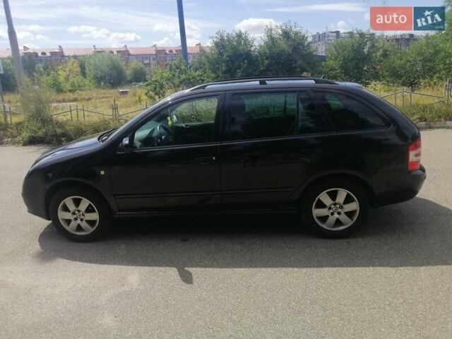 Черный Шкода Фабия, объемом двигателя 1.4 л и пробегом 235 тыс. км за 4700 $, фото 18 на Automoto.ua