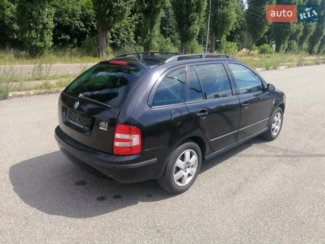 Черный Шкода Фабия, объемом двигателя 1.4 л и пробегом 235 тыс. км за 4700 $, фото 12 на Automoto.ua