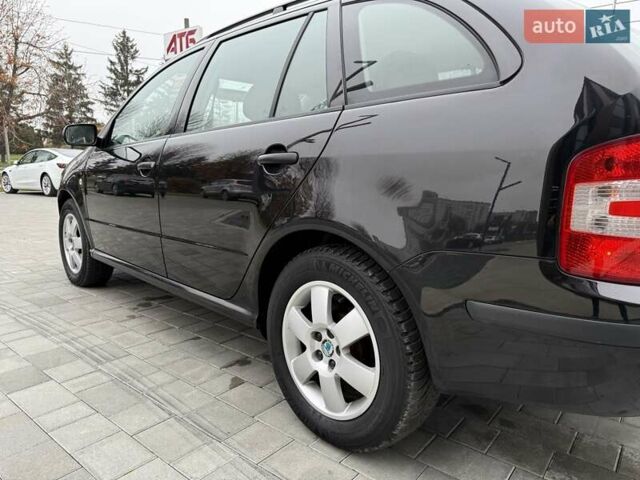 Черный Шкода Фабия, объемом двигателя 1.39 л и пробегом 249 тыс. км за 4550 $, фото 20 на Automoto.ua
