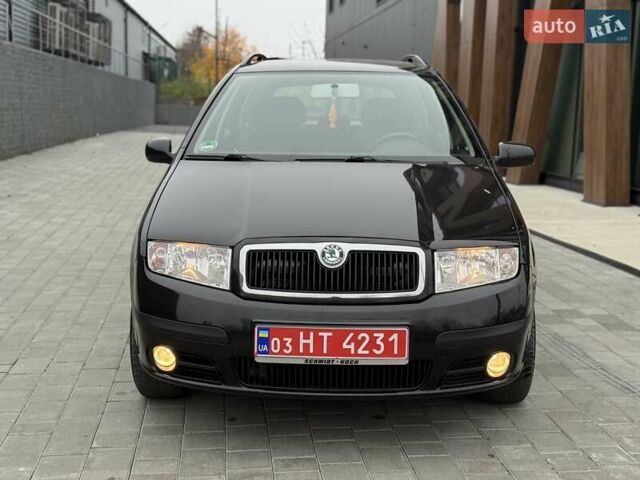 Черный Шкода Фабия, объемом двигателя 1.39 л и пробегом 249 тыс. км за 4550 $, фото 14 на Automoto.ua