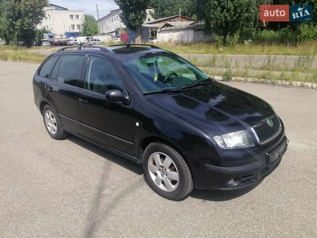 Черный Шкода Фабия, объемом двигателя 1.4 л и пробегом 235 тыс. км за 4700 $, фото 7 на Automoto.ua
