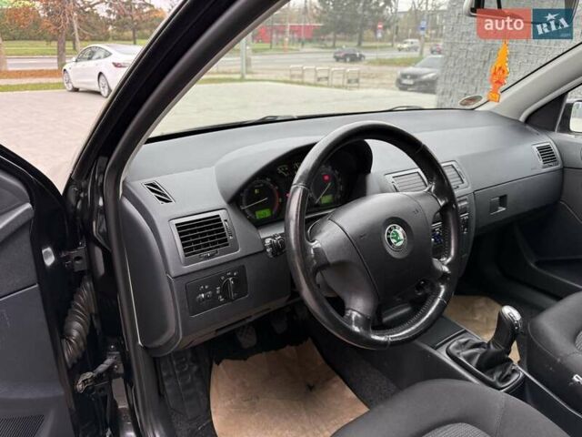 Черный Шкода Фабия, объемом двигателя 1.39 л и пробегом 249 тыс. км за 4550 $, фото 28 на Automoto.ua