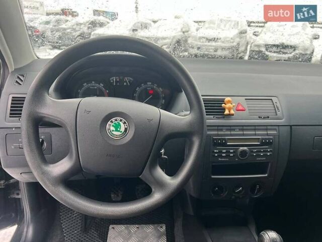 Черный Шкода Фабия, объемом двигателя 1.4 л и пробегом 276 тыс. км за 5440 $, фото 22 на Automoto.ua