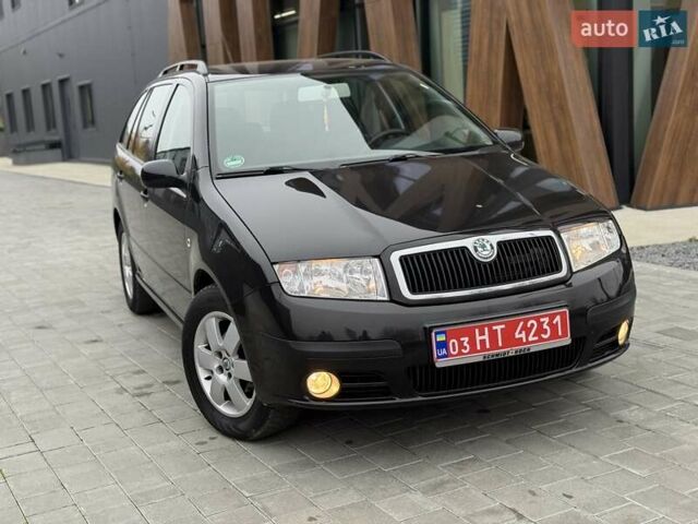 Черный Шкода Фабия, объемом двигателя 1.39 л и пробегом 249 тыс. км за 4550 $, фото 7 на Automoto.ua