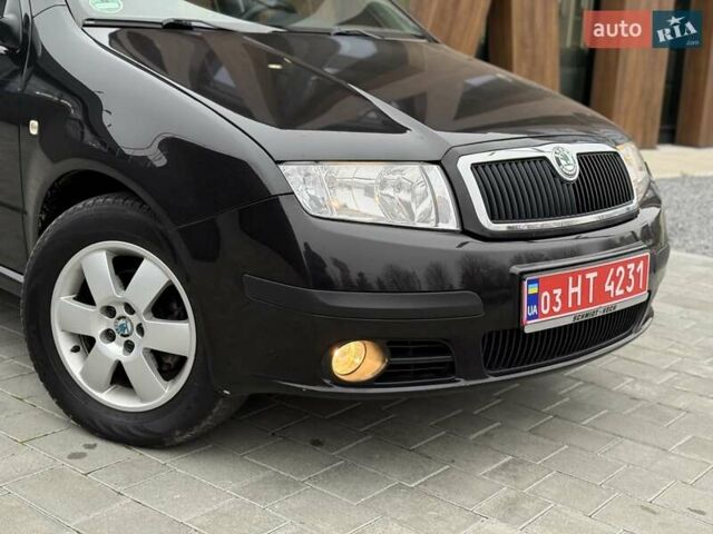 Черный Шкода Фабия, объемом двигателя 1.39 л и пробегом 249 тыс. км за 4550 $, фото 6 на Automoto.ua