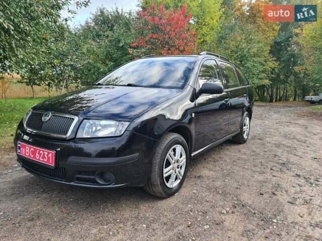 Черный Шкода Фабия, объемом двигателя 1.4 л и пробегом 196 тыс. км за 4699 $, фото 3 на Automoto.ua