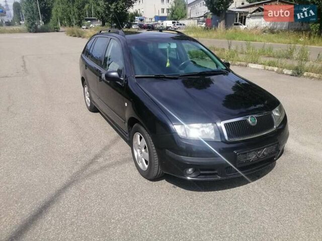 Черный Шкода Фабия, объемом двигателя 1.4 л и пробегом 235 тыс. км за 4700 $, фото 3 на Automoto.ua